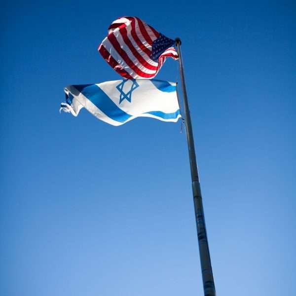 Shot of the flagpole showing the US and Israeli flag