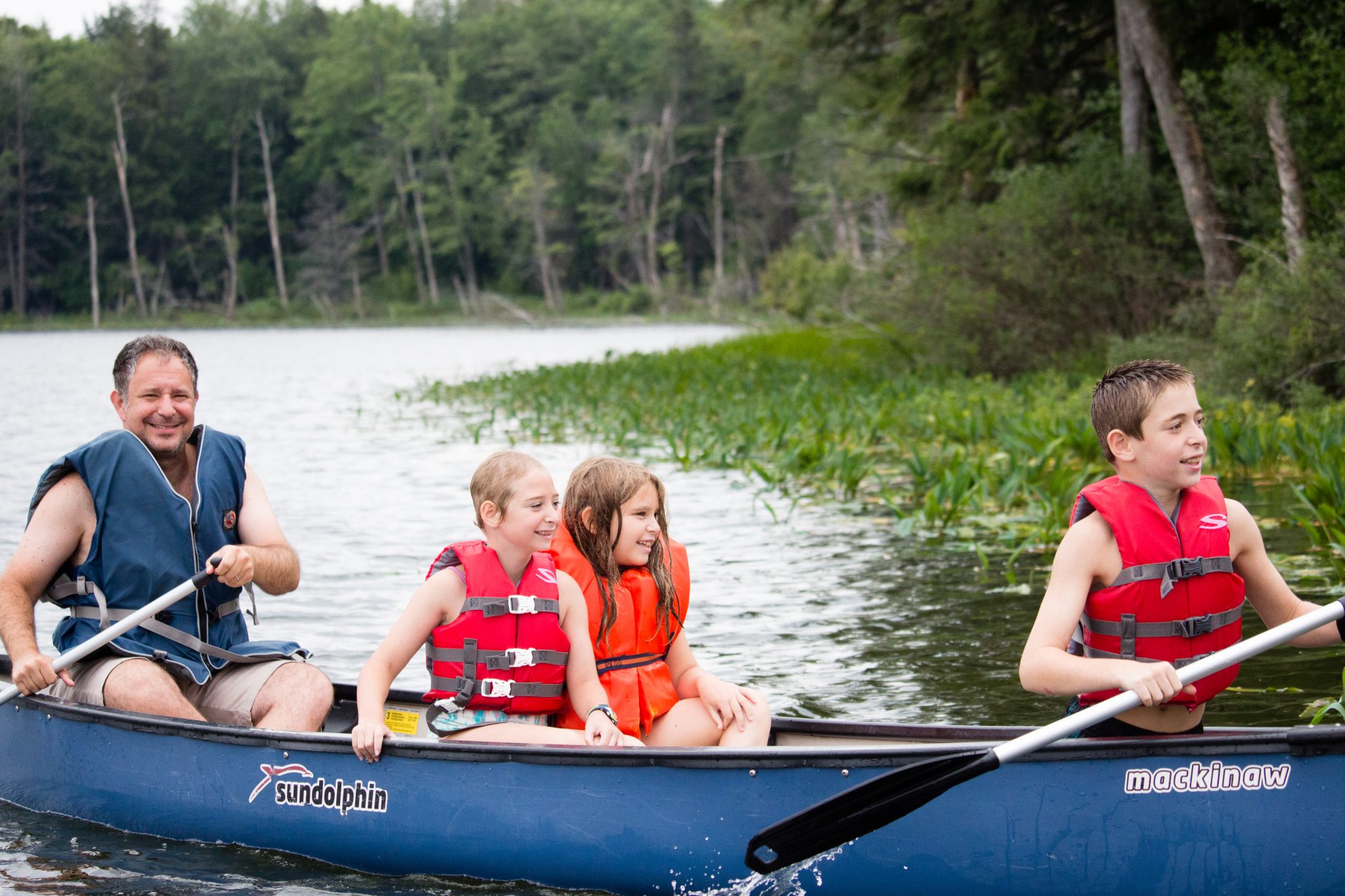 Family boating on the lake